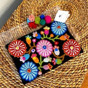 NWT Noonday embroidered clutch